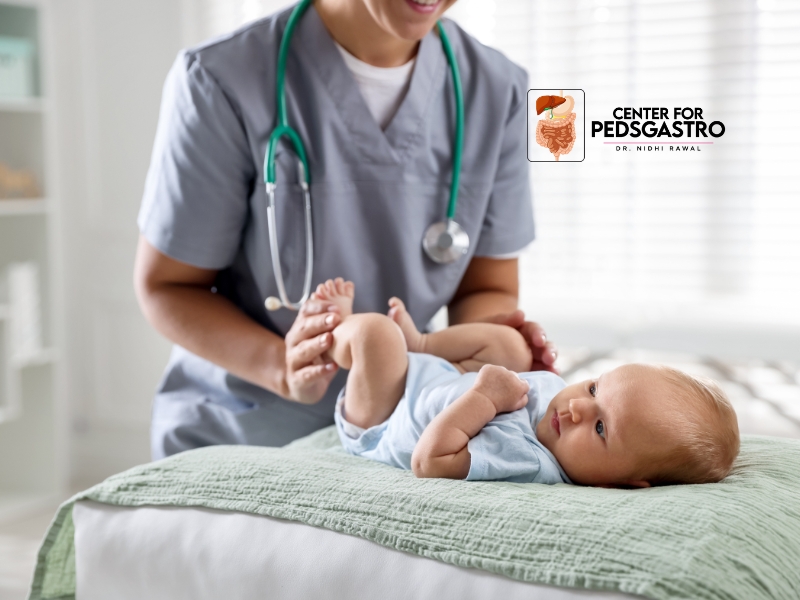 Infant vomiting specialist doctor treating digestive and stomach issues in babies